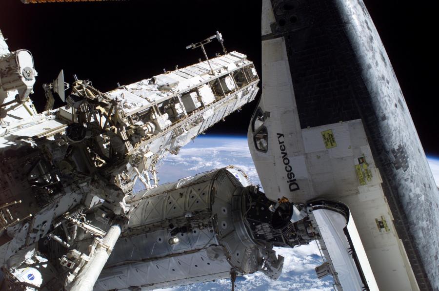 Space Shuttle Discovery docked with the International Space Station in 2005 