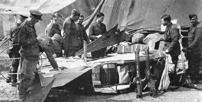 Examining the remains of the Red Barons triplane 1918 (Photo: Sergeant John Alexander, official No. 3 Squadron photographer)