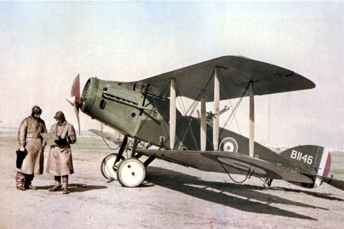 Observer, pilot, and Bristol Fighter F2B aircraft, Serial B1146, of No. 1 Squadron, Australian Flying Corps circa February 1918 in the territory of the Ottoman Empire: Palestine, Mejdel Jaffa Area, Mejdel. The pilot (left) is Captain (Capt) Ross Macpherson Smith, MC and bar, DFC and two bars (Photo Source: AWM photo taken by James Francis Hurley)