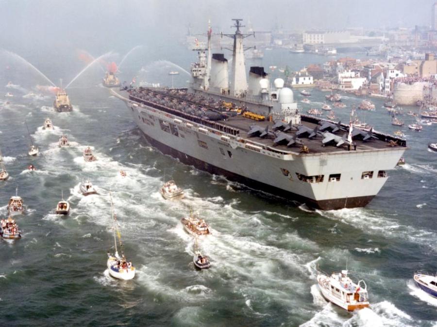 HMS Invincible returns to the UK with much jubilation following victory in the Falklands War 1982