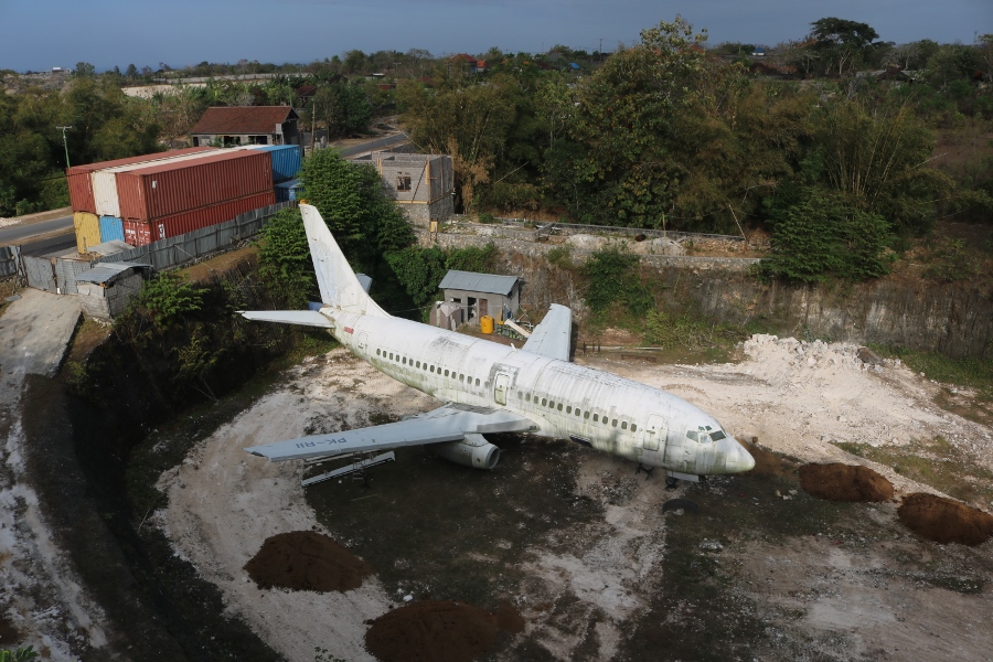 Bali abandoned Boeing 737 located in a random old quarry near Pandawa Beach south of Kuta on the Bukit Peninsula Indonesia